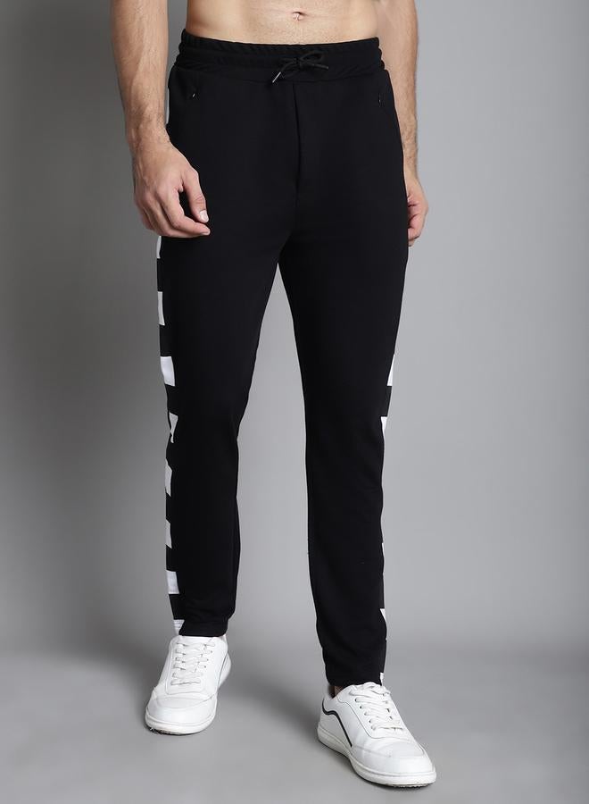 تايك تو بنطلون رياضي رجالي بخصر مطاطي وخطوط جانبية أسود من دور - Image 1