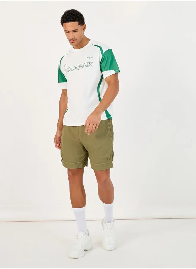 ستايلي 7inch Quick Dry Woven Shorts with Tape Hem & Zip Detail