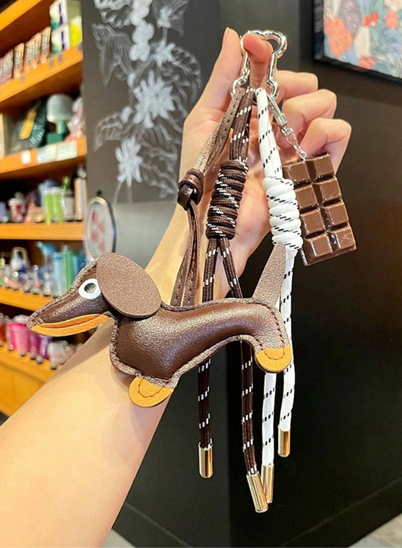 Cute dog design keychain with chocolate bar attached - Image 1