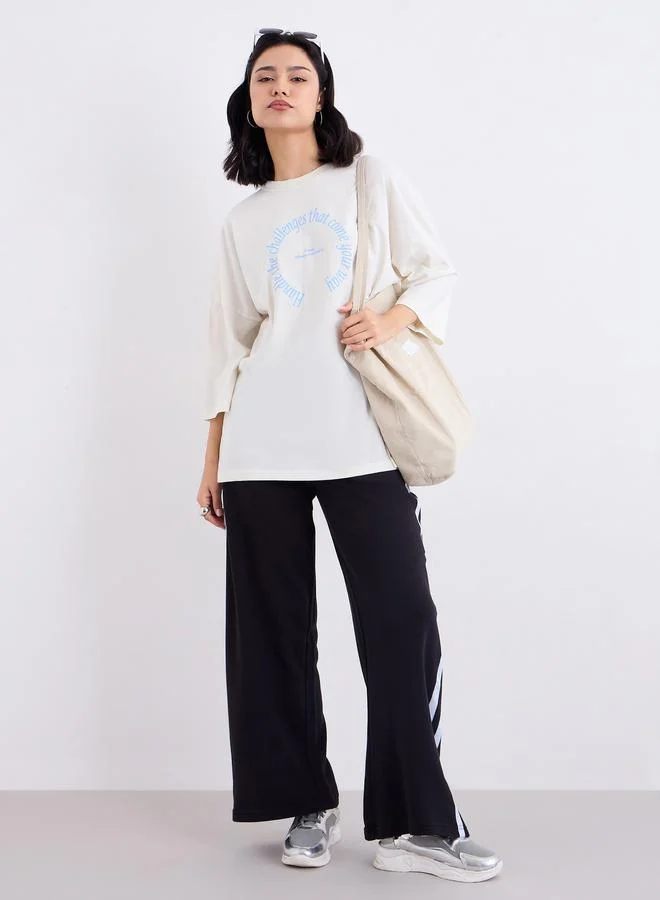 Styli Styli Cream Oversized Slogan Print T-Shirt