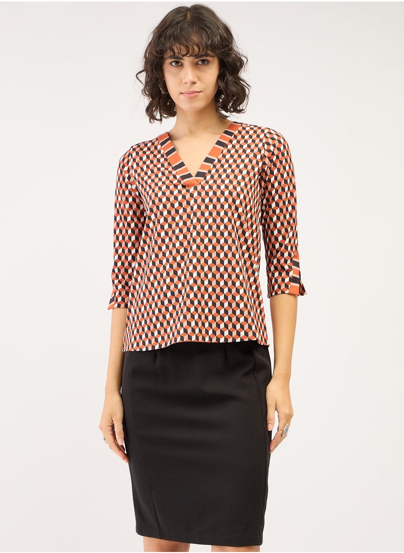 Salt Attire Women's Multi-Color Geometric Pattern Top with V-Neckline, Contrast Pattern Placement Detail, and 3/4th Length Slitted Sleeves for a Bold and Modern Look  - Image 1