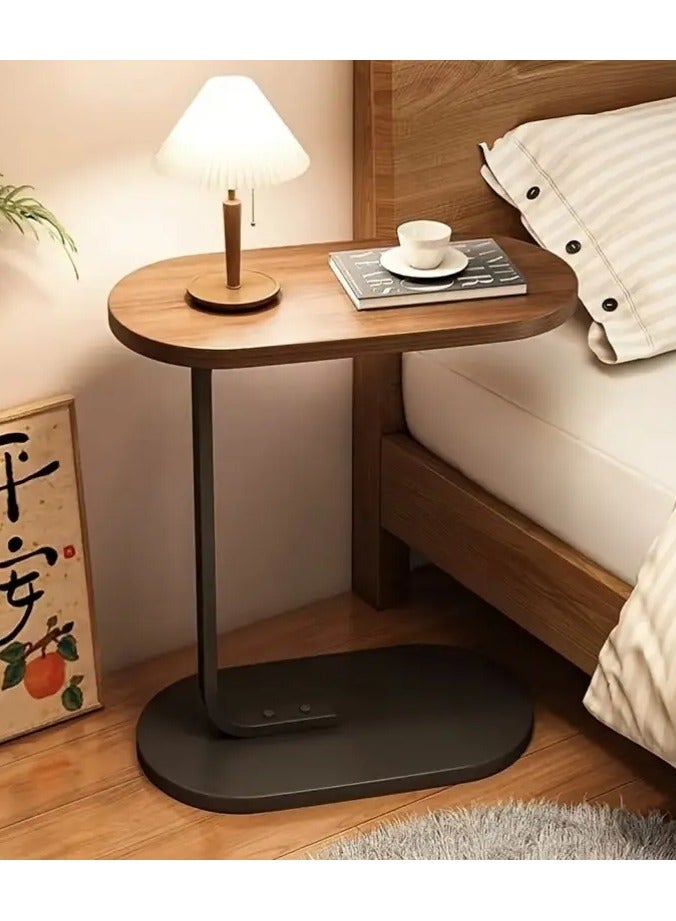 Generic Side service tables C-shaped design movable pull brown color and black frame Versatile for home for small spaces Used on the sofa in front of the TV and you can put it in the living room, bedroom, balcony, study with book and coffee or alarm clock or pot plants etc. Stylish and modern design that will easily fit into your other furniture styles that can slide next to the sofa or bed easily Perfectly fit small spaces The table is rustproof, waterproof and scratch-resistant Easy to assemble, simple to install and requires only a few basic operations It takes only 11 minutes  - Image 2