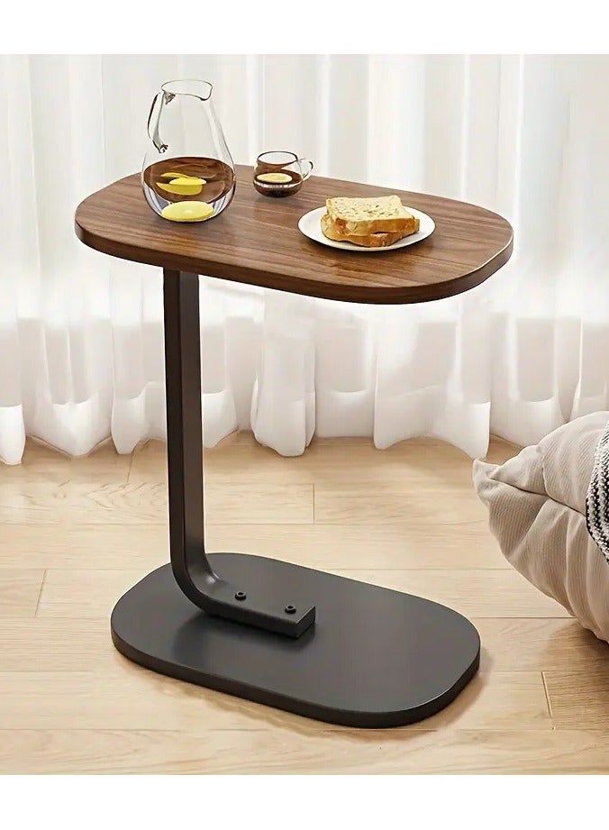 Generic Side service tables C-shaped design movable pull brown color and black frame Versatile for home for small spaces Used on the sofa in front of the TV and you can put it in the living room, bedroom, balcony, study with book and coffee or alarm clock or pot plants etc. Stylish and modern design that will easily fit into your other furniture styles that can slide next to the sofa or bed easily Perfectly fit small spaces The table is rustproof, waterproof and scratch-resistant Easy to assemble, simple to install and requires only a few basic operations It takes only 11 minutes  - Image 1