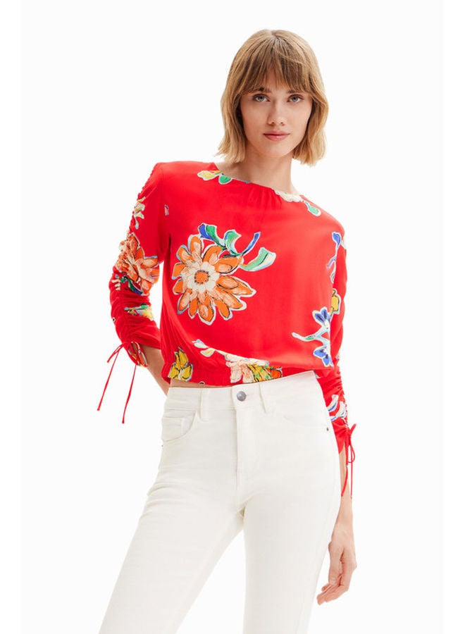 Short gathered floral blouse