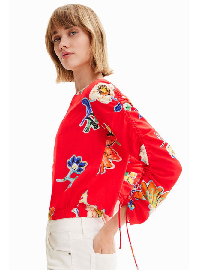 Short gathered floral blouse