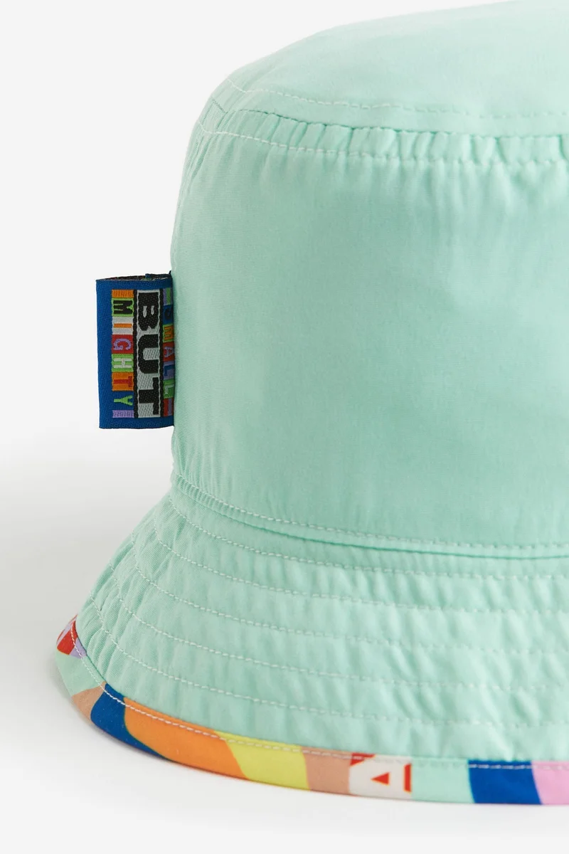 اتش اند ام قبّعة باكيت قابلة للعكس