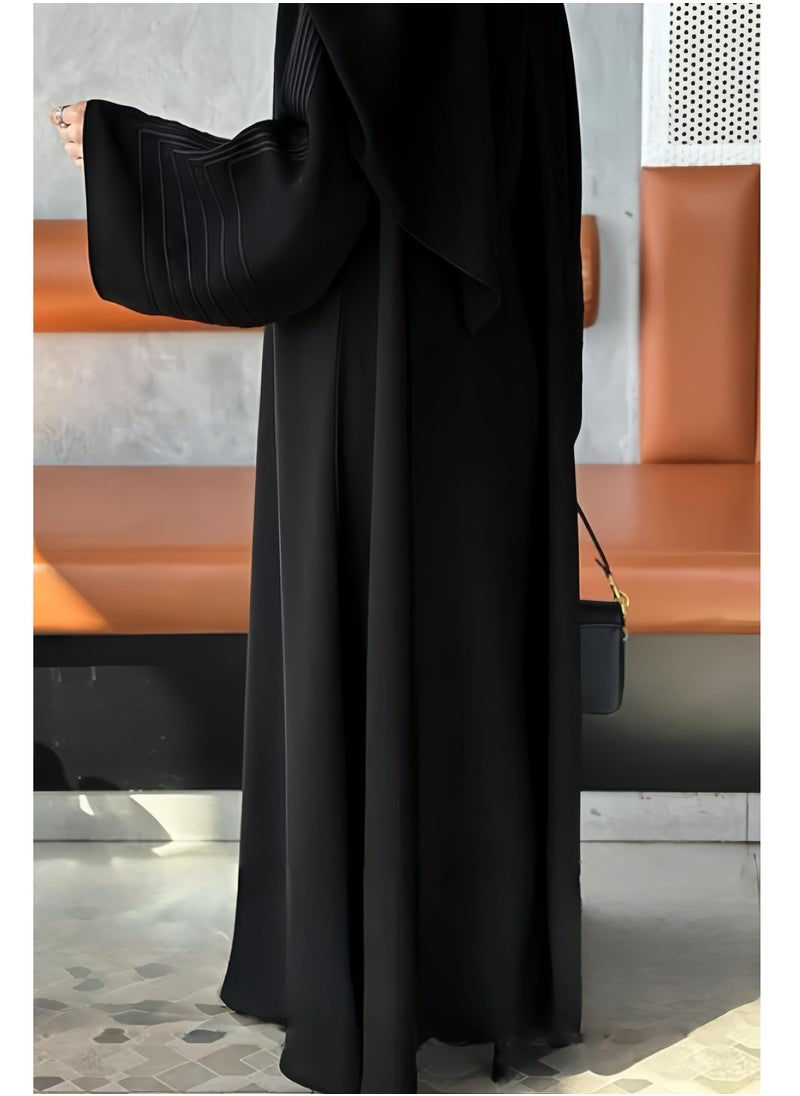Saba abaya with elegant qitan detail offering a refined modest look with soft lines and a modern touch perfect for daily wear and simple occasions