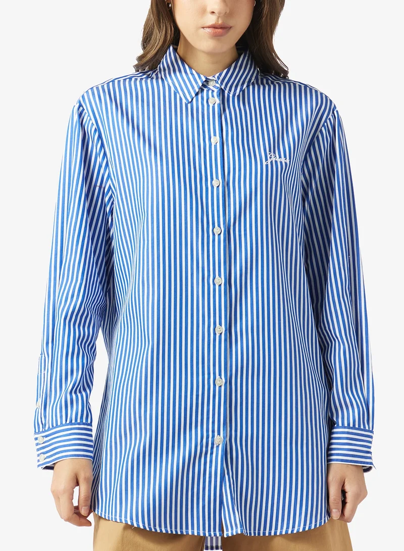 جس قميص بأزرار مخططة