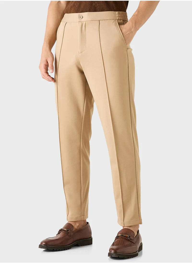 ايكونيك Iconic Solid Slim Fit Trousers with Pockets