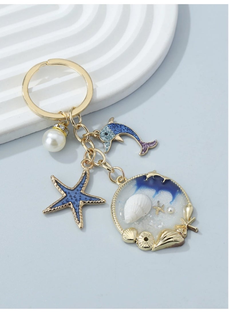ڤيا ميدلية مفاتيح بوهمية بتصاميم بحرية — صدفة، نجمة بحر، دولفين وخَرَز لؤلؤي كيوت - Image 3