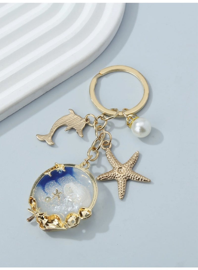 ڤيا ميدلية مفاتيح بوهمية بتصاميم بحرية — صدفة، نجمة بحر، دولفين وخَرَز لؤلؤي كيوت - Image 2