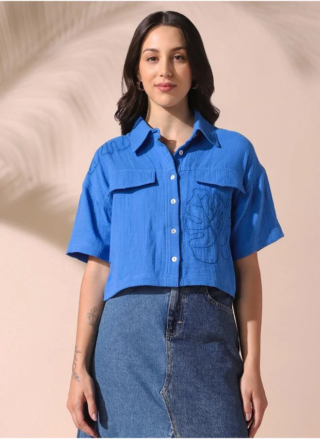 Dennis Lingo Women blue relaxed fit solid half sleeves button down 100% cotton shirts with button closure featuring a spread collar- your next go-to for effortless flair.