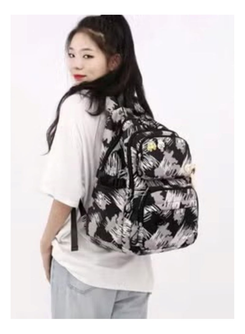 هويتك حقيبة ظهر بعجلات للأطفال بتصميم ضربات الفرشاة ولعبة قطيفة - Image 2