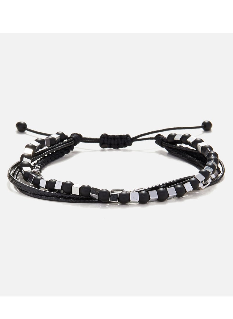 CHRYSOSTOMOS Handmade Adjustable Beaded Multi-Line Bracelet with Onyx, Squared Hematite, Cords and Braided Chain - Image 1