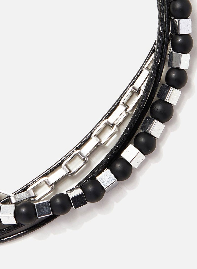 CHRYSOSTOMOS Handmade Adjustable Beaded Multi-Line Bracelet with Onyx, Squared Hematite, Cords and Braided Chain - Image 2