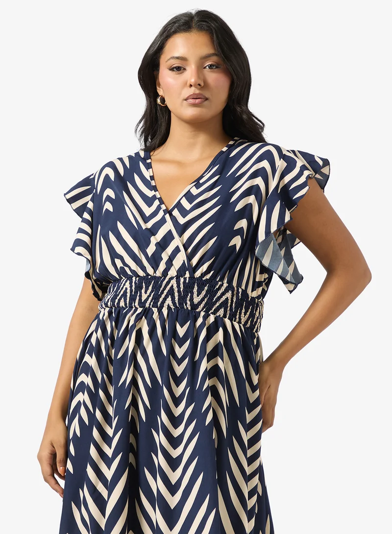 Ella Plus Montone Print Dress