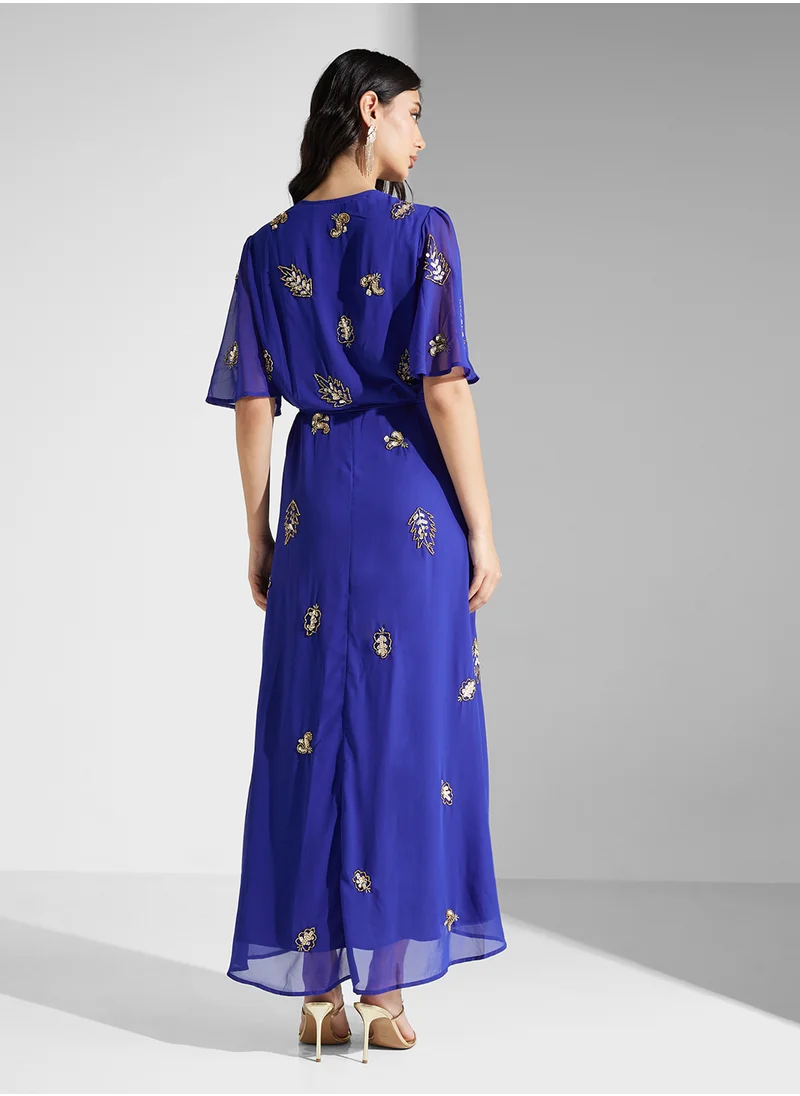 Hope & Ivy Embellished Flutter Sleeve Wrap Dress