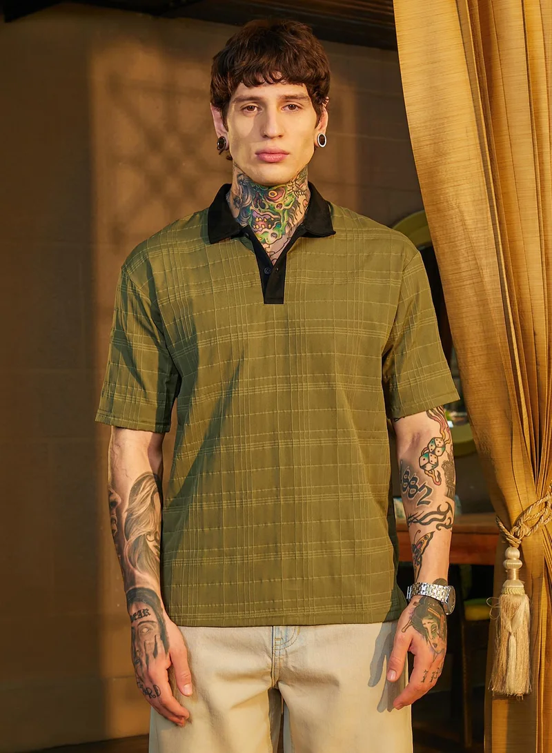 كامبوس سوترا تيشيرت بولو رجالي بلون أخضر زيتوني وأسود أونيكس بتصميم شبكي متباين