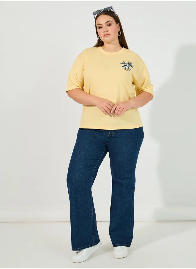 Styli Styli Plus Size Slogan Print Oversized T-Shirt