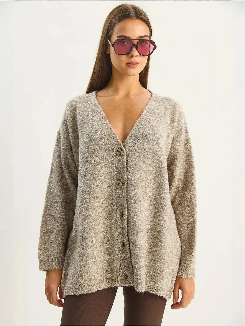 Bianco Lucci Beige Natural LUCCI Textured V-neck Buttoned Cardigan for Women | Best Price UAE