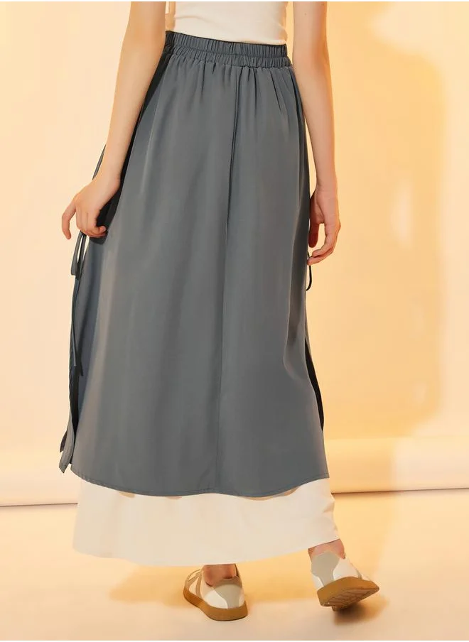 Styli Color Block Layered A-Line Maxi Skirt with Tie-Up Detail