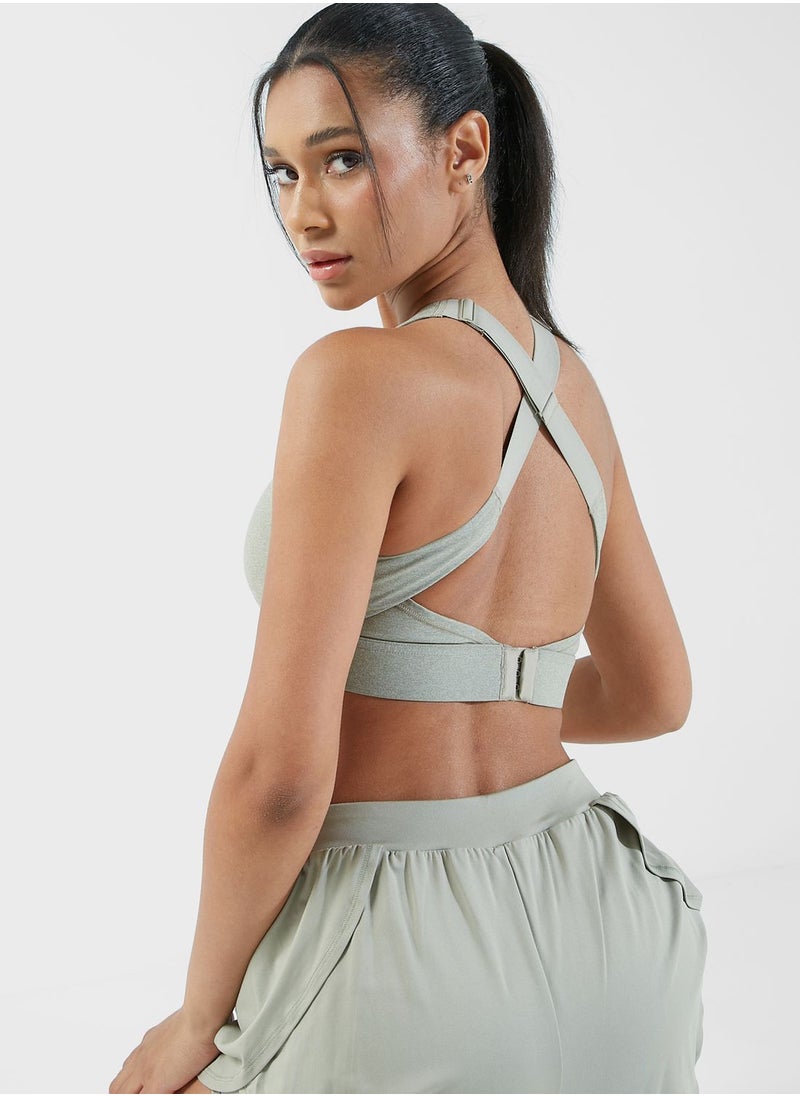 PUMA - Yogini Mid Impact Crossover Bra - Image 1