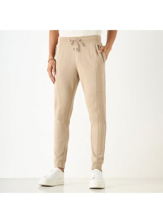 Iconic Textured Joggers with Drawstring Closure and Pockets - pzsku/Z1DBBD612AC44EAC85272Z/45/_/1728453820/258c9ae3-99d8-4e14-a989-e02bb52dcf5e