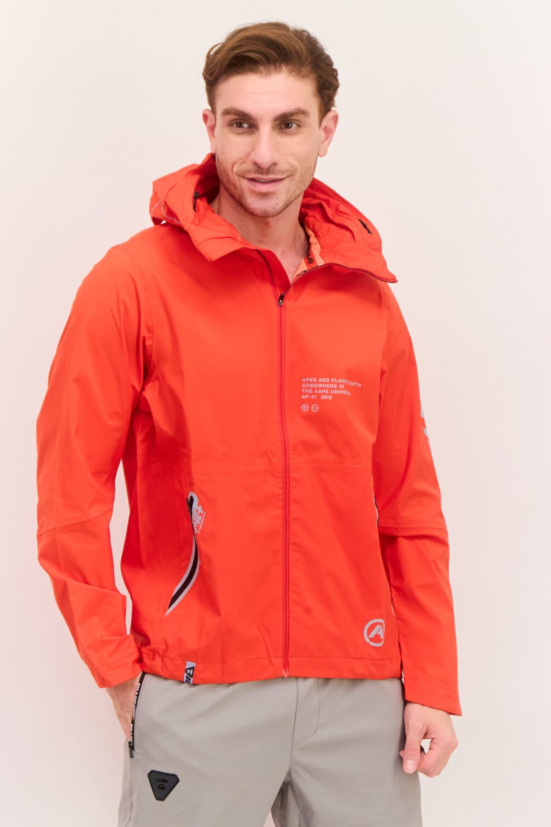 Aape By A Bathing Ape جاكيت واقي من الرياح للرجال بتصميم جرافيكي، أحمر - Image 1