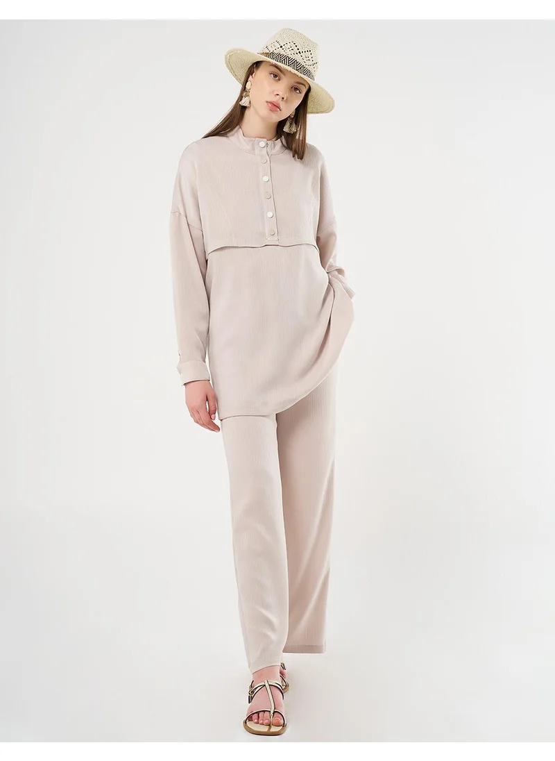 Kayra Snap-Button Closure High-Neck Sweatshirt in Stone
