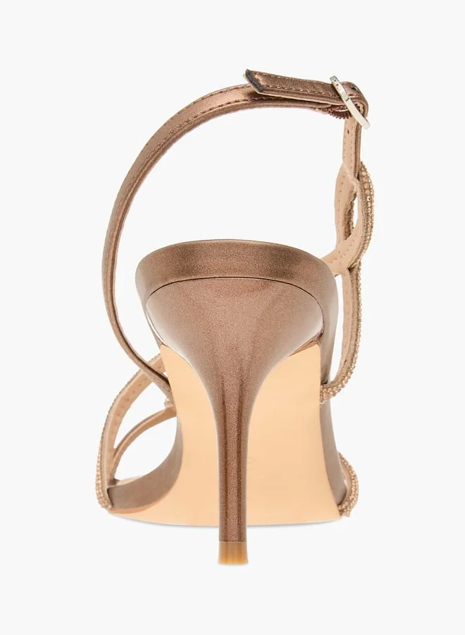 فلورا بيلا من شو إكسبرس Women Embellished Sandals with  Stiletto Heels and Buckle Closure