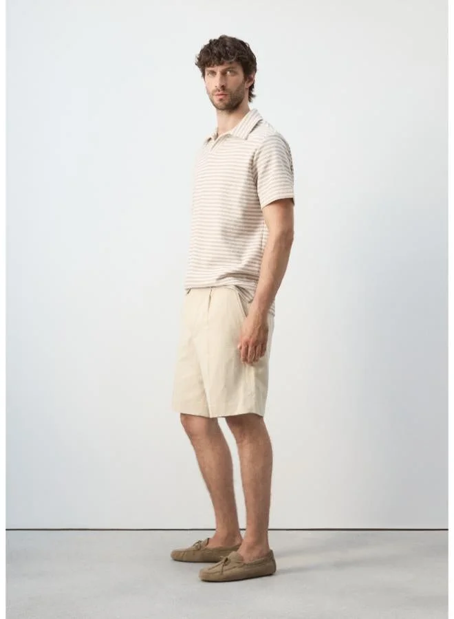 Mango Man  Regular fit textured stripe polo for Men | Best Price UAE