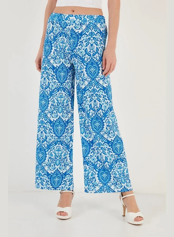 ليلا بنطلون واسع بخصر مطاطي بنقشة ليلا للنساء