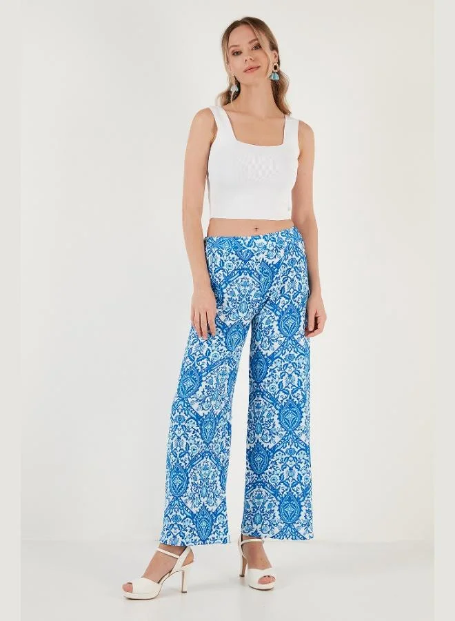 ليلا بنطلون واسع بخصر مطاطي بنقشة ليلا للنساء