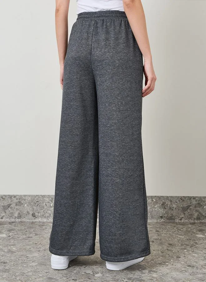 Styli Solid High Rise Flared Jogger