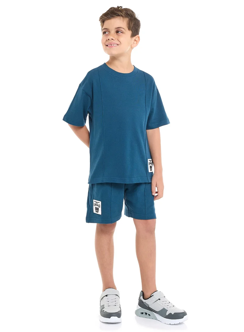 victor and jane Oversized - Boys' Jacquard 2-Piece Set - T-Shirt with Badge Detail and matching Shorts with Pockets,