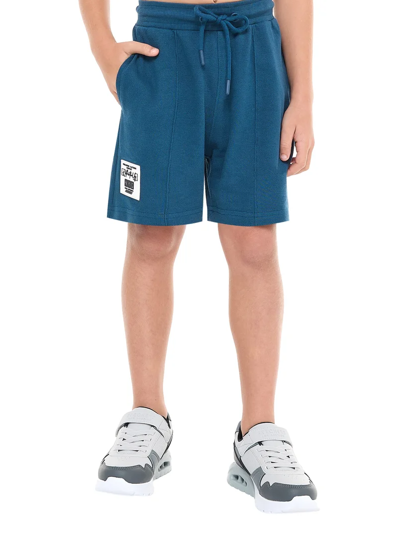 victor and jane Oversized - Boys' Jacquard 2-Piece Set - T-Shirt with Badge Detail and matching Shorts with Pockets,