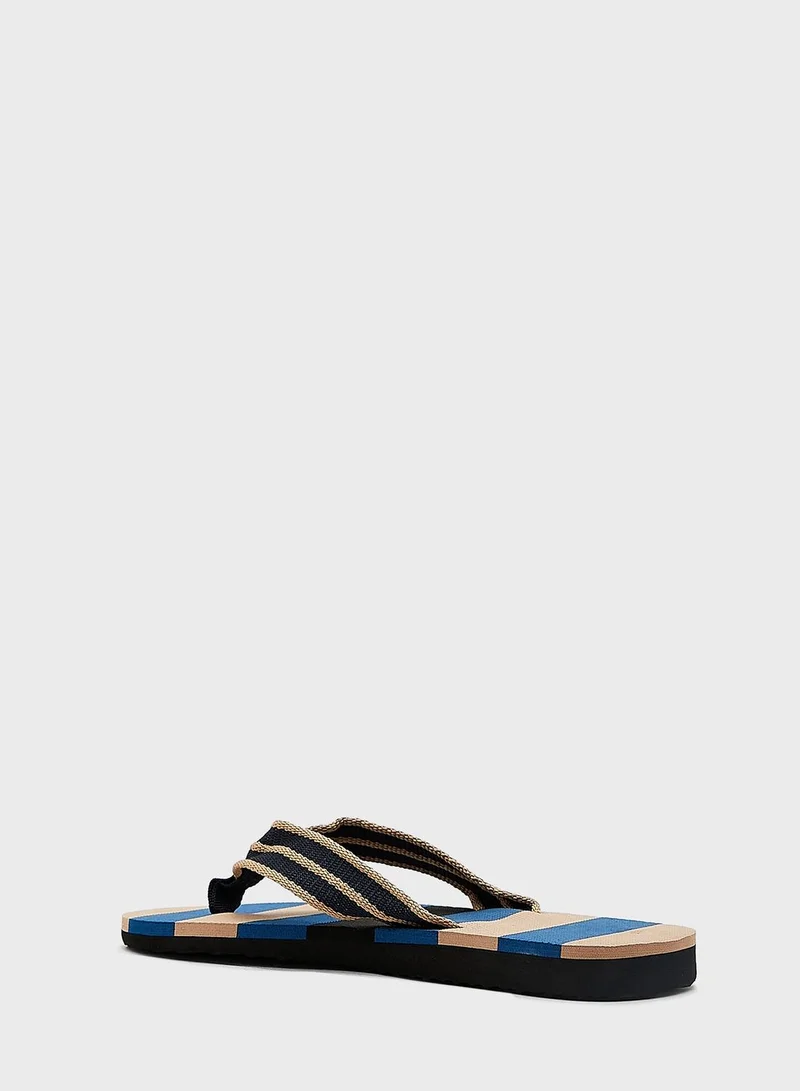 Seventy Five Striped Summer Flip Flops