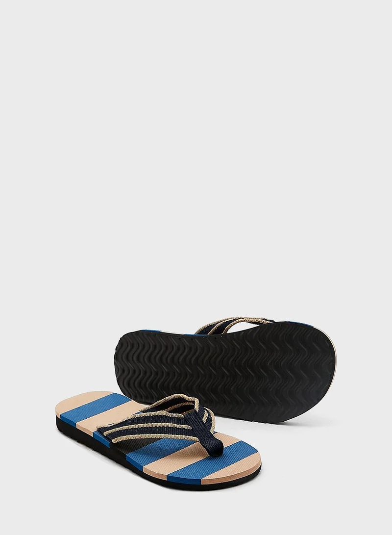 Seventy Five Striped Summer Flip Flops