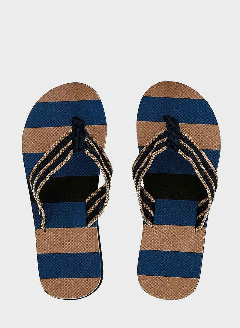 Seventy Five Striped Summer Flip Flops