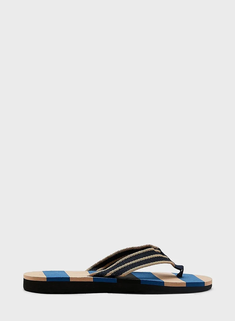 Seventy Five Striped Summer Flip Flops