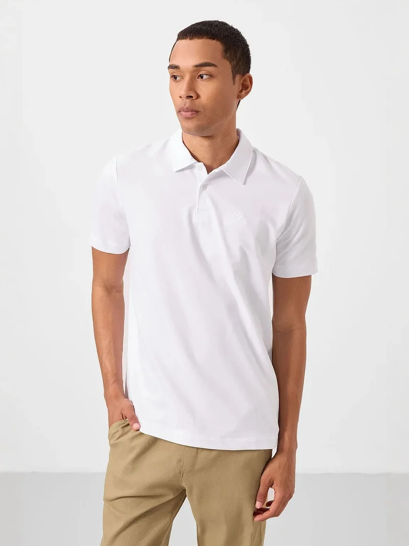 تومي لايف TOMMY Men's Cotton-Blend Polo T-Shirt