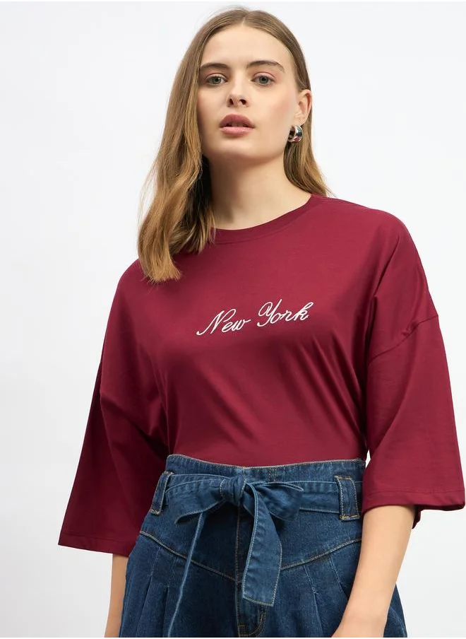 ستايلي Styli Embroidered Slogan Round Neck Oversized T-Shirt
