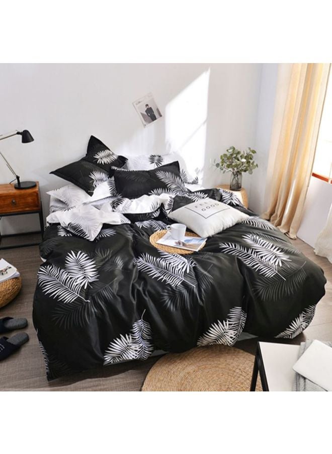 طقم أغطية سرير بطبعة ورقة شجر مكون من 4- قطع مختلط أسود/ أبيض Quilt Cover 150x200 cm, Pillow Cover 48x74 cm, Fitted Sheet 180x220سم - Image 1