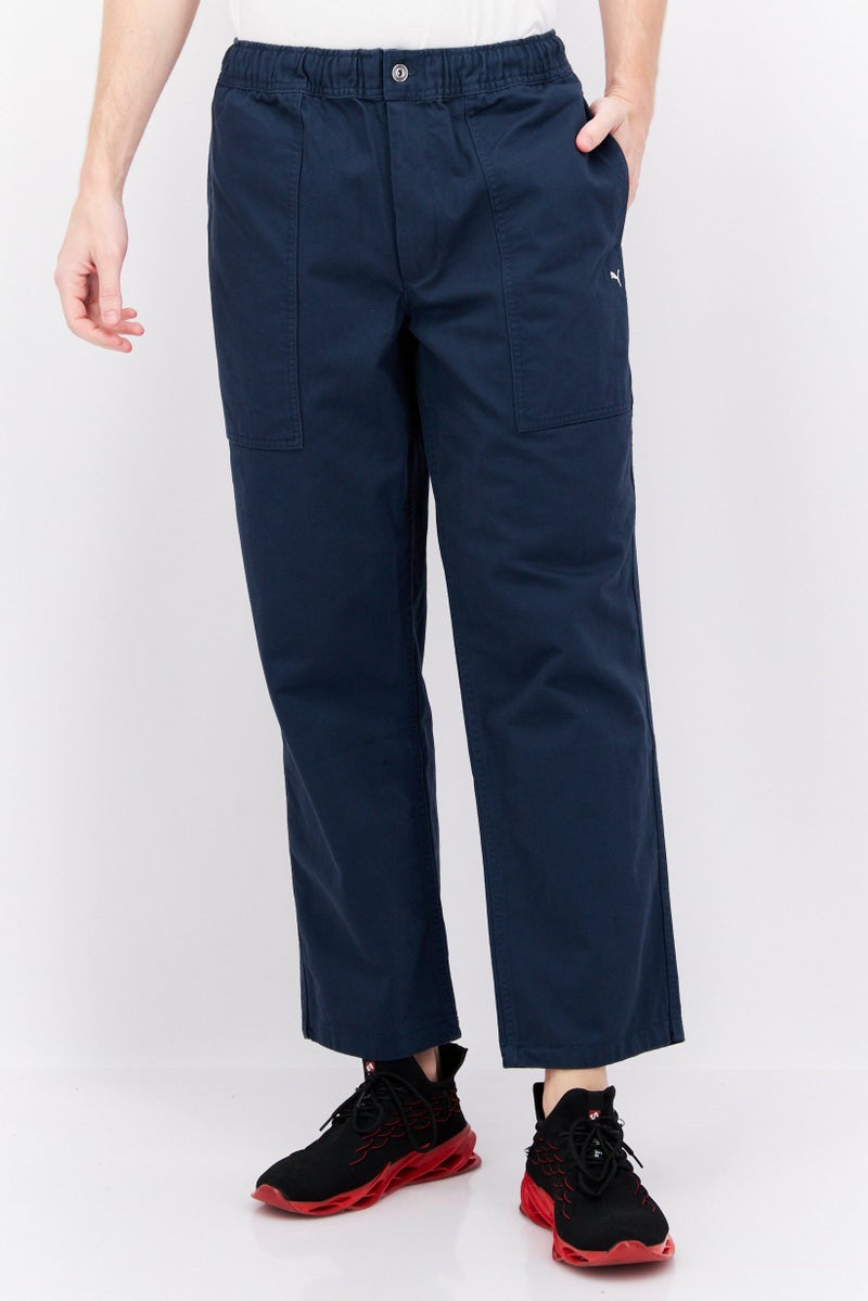 PUMA Men Sportswear Fit Outdoor Pants, Navy Blue - Image 1