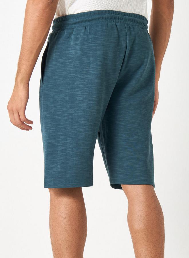 كابا شورت بتطريز شعار ورباط إغلاق وجيوب من كابا - Image 3