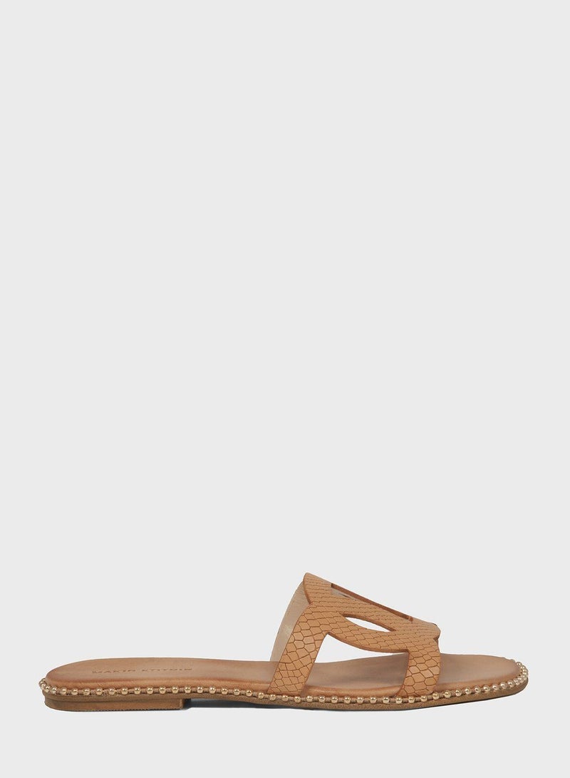 MAKIS KOTRIS Wide Strap Studded Flat Sandal - Image 1