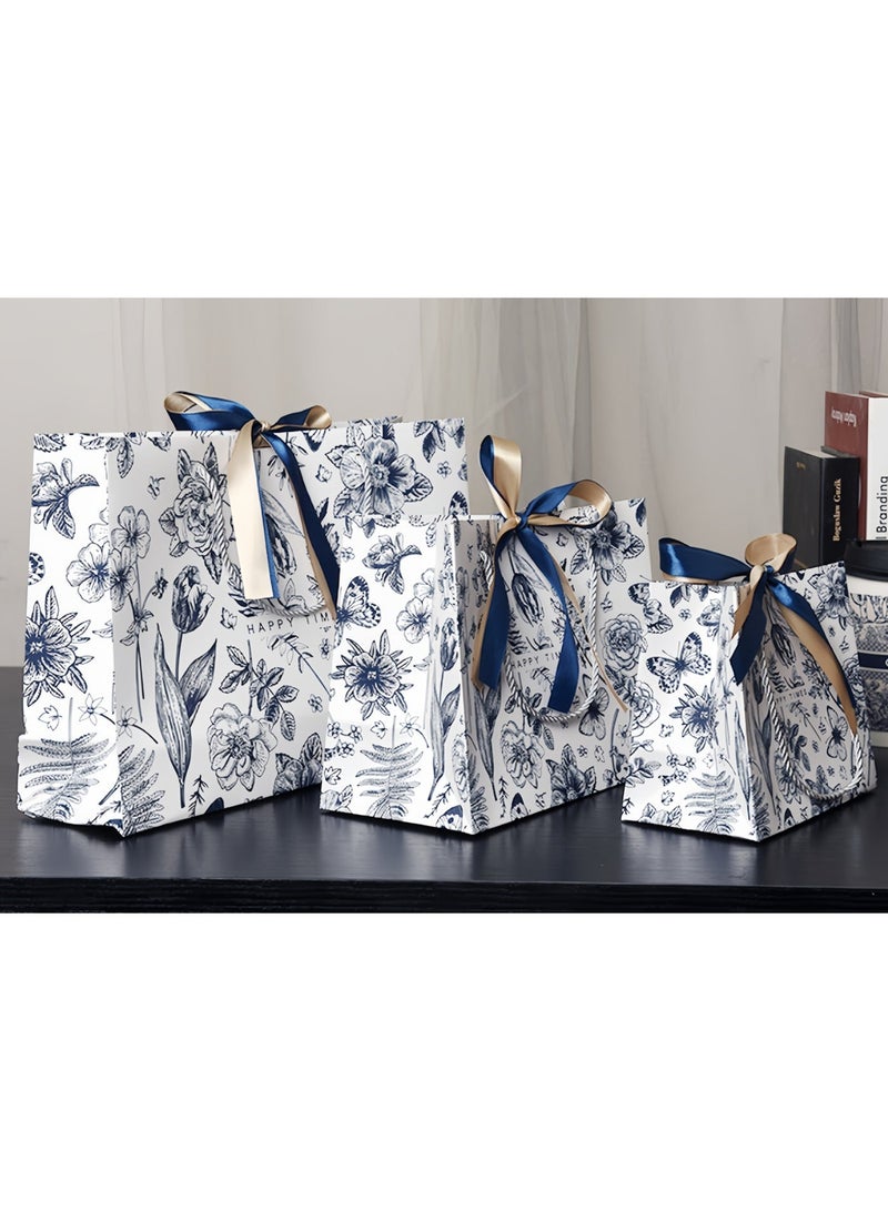 سيسلي أكياس هدايا ورقية 4 قطع بنقشة زهور أزرق وأبيض، 3 مقاسات كبير متوسط صغير، أشرطة أزرق كحلي وذهبي شامبانيا، طقم أكياس هدايا للحفلات وأعياد الميلاد والمناسبات الخاصة - Image 2