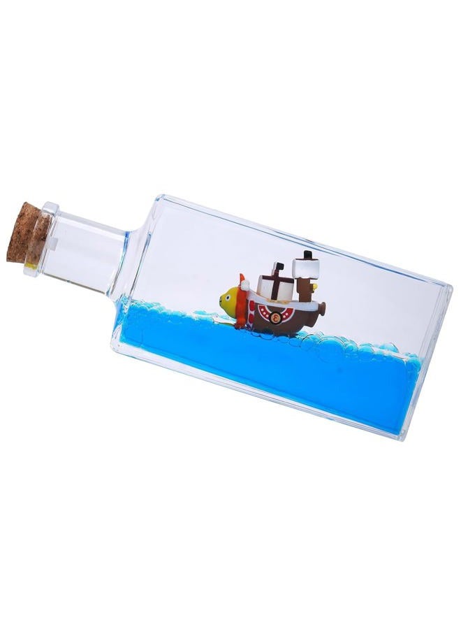 YimiBloss Unsinkable Thousand Sunny Anime Pirate Ship in A Bottle, Floating Ocean Desk Decor, Anime Themed Liquid Motion Decoration, Unique Gift for Fans and Office Home Desk Ornament - Image 1