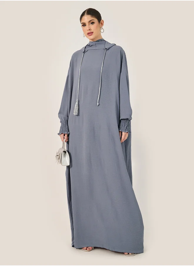 ستايلي Oversized Hooded Jalabyia with Tassel Detail