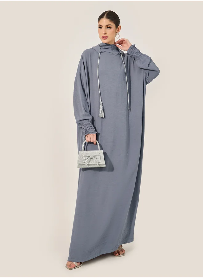 ستايلي Oversized Hooded Jalabyia with Tassel Detail
